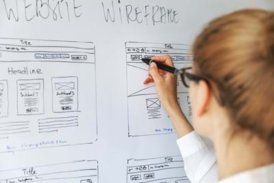whiteboard drawing of website wireframe